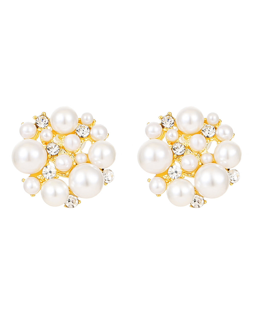 Pair of pearl earrings with gold accents on a white background