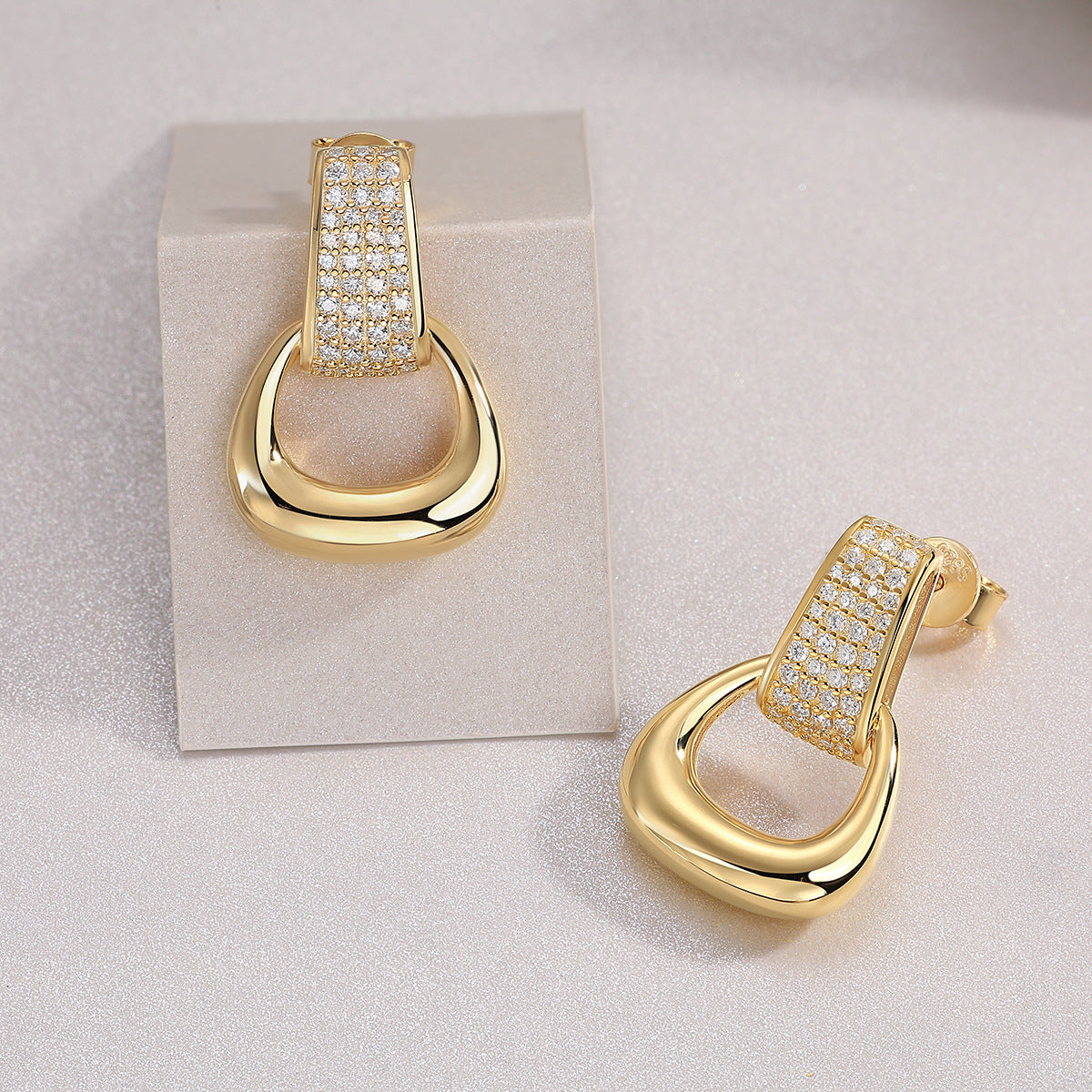 Side profile with post – gold pavé huggie earring