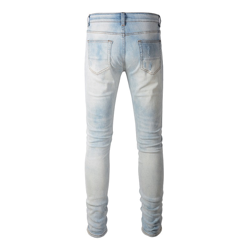 Men's Water-Worn Patched Torn Jeans in Baby Blue Wash