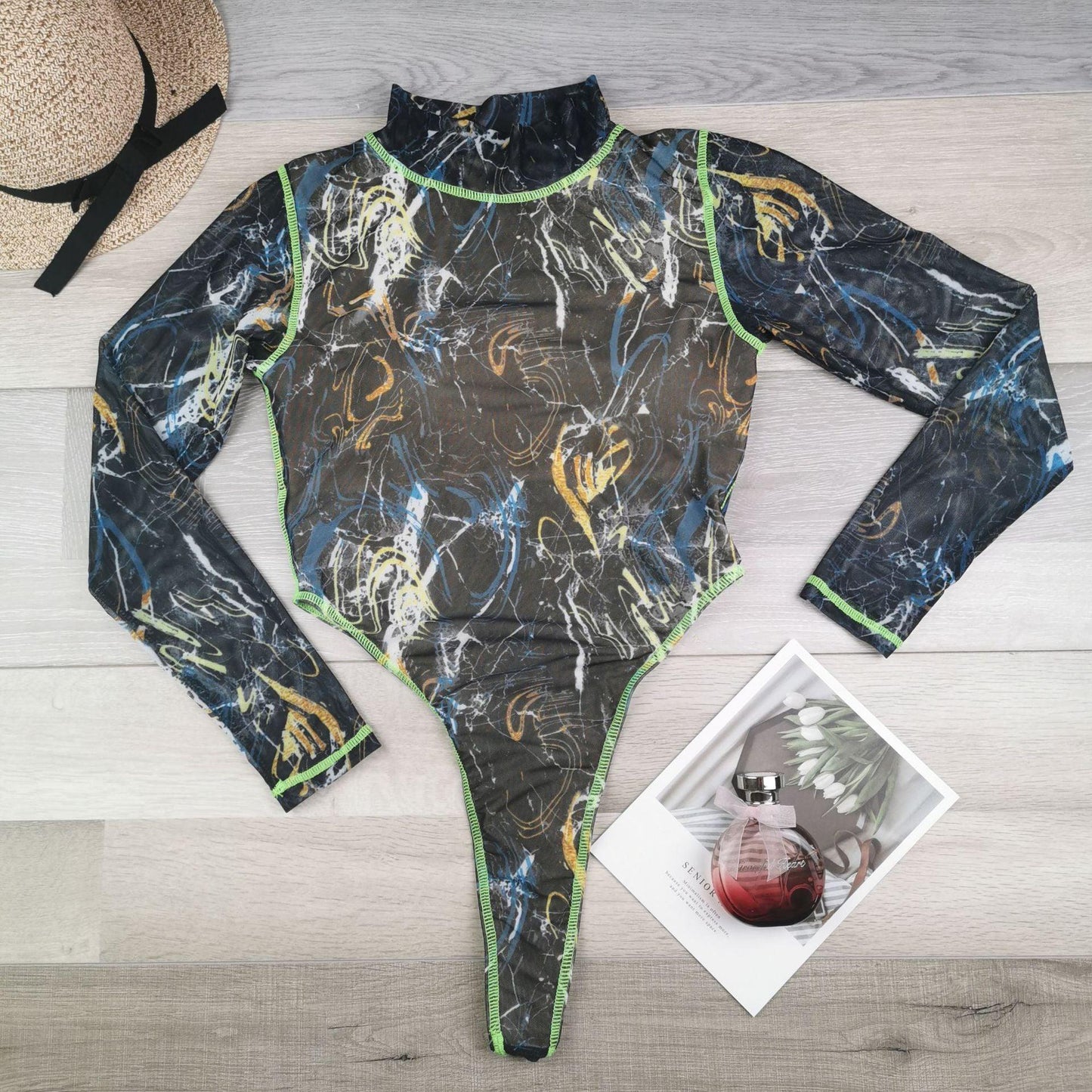 Trendy Long Sleeve Animal Print Swimsuit with Elegant Fishnet Detail - ForVanity women's lingerie, women's swimwear Swimwear